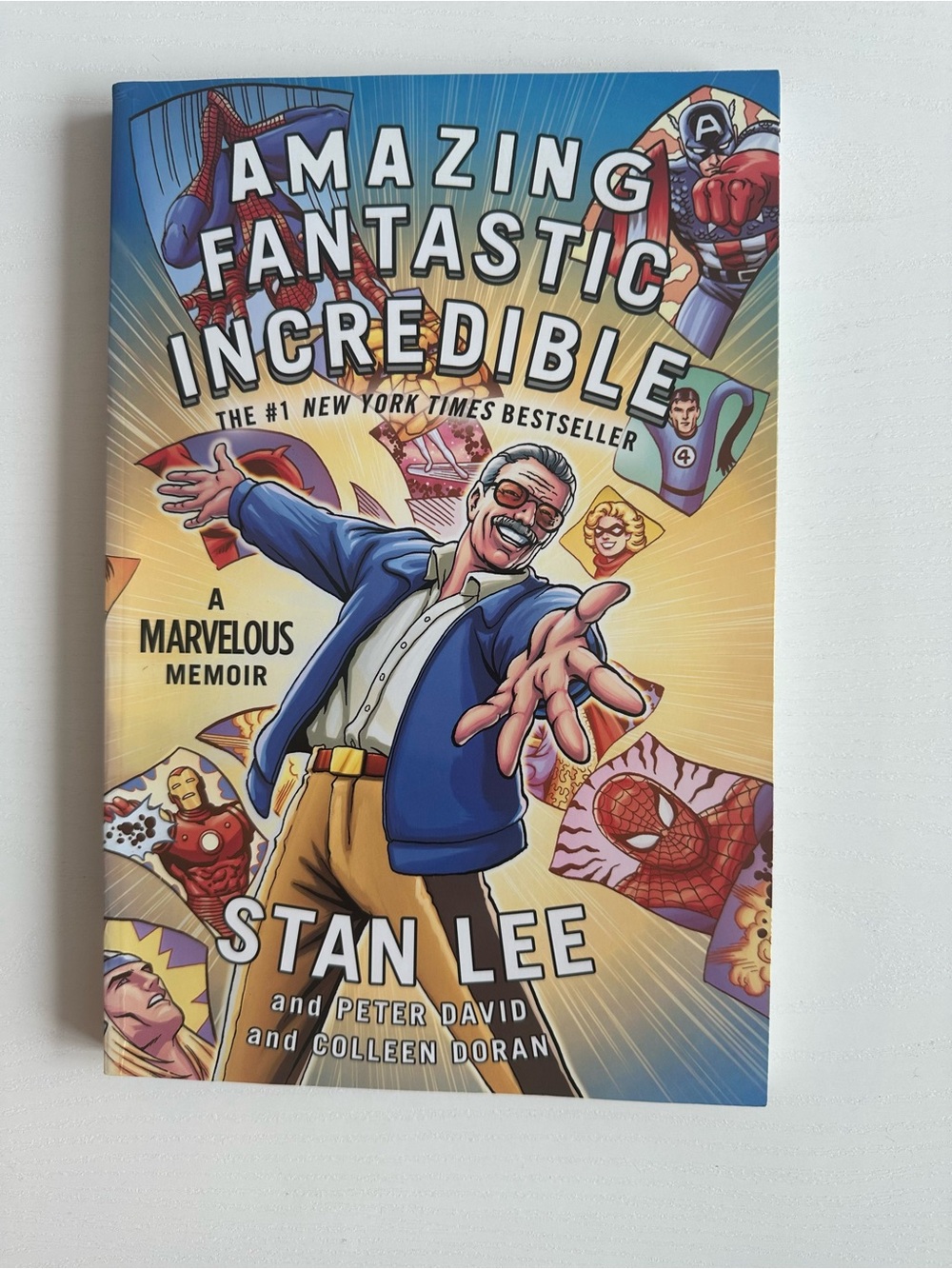 Marvel Stan Lee Hardcover Book with Blue, Yellow, Red Cover Art